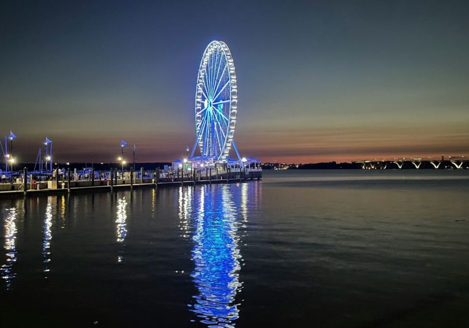 An image of a ferris wheel at night in National Harbor